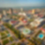 Aerial view of Dubai International Academic City showcasing diverse educational institutions and green spaces.